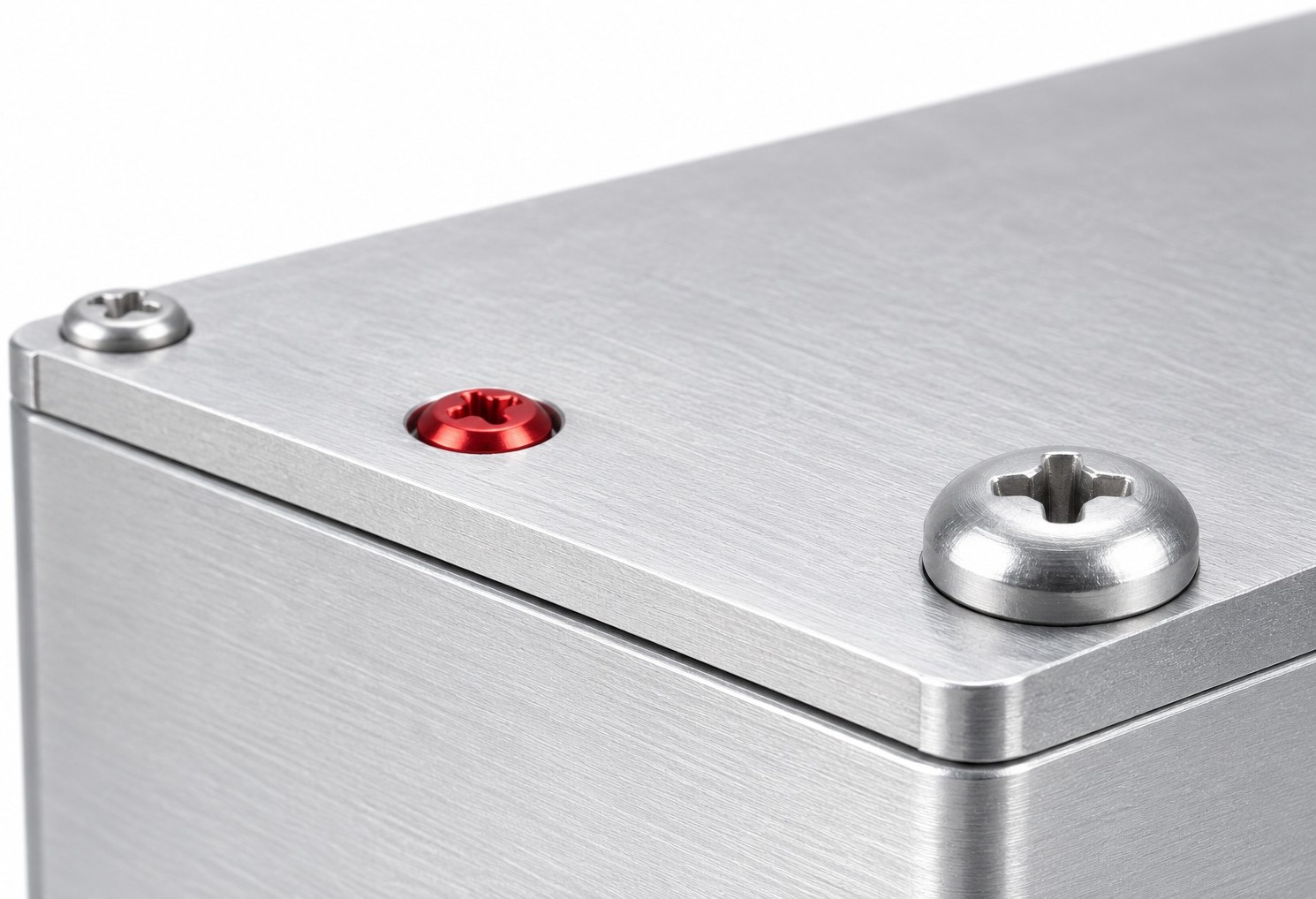 Anodized aluminum screws fastening a lightweight enclosure panel