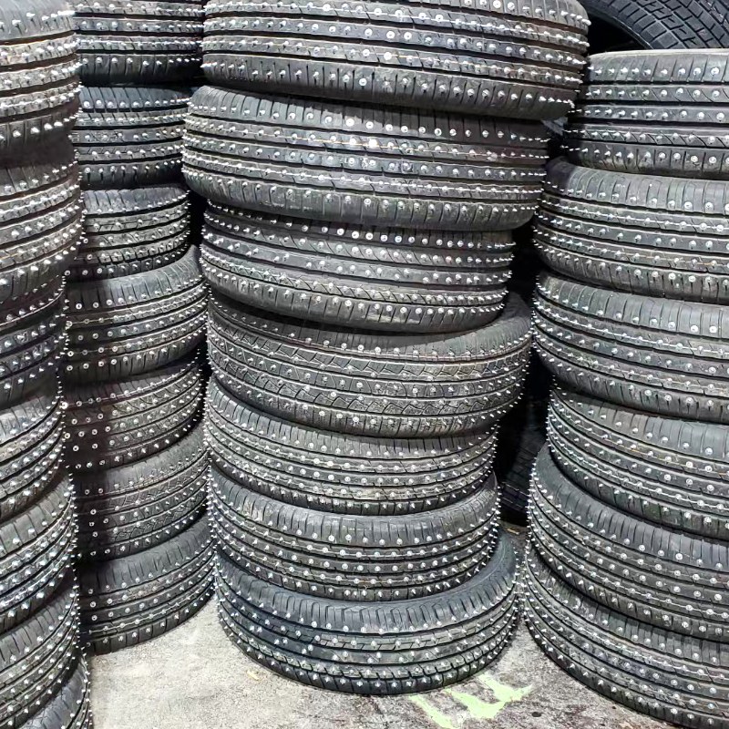 Stack of studded winter tires for ice racing