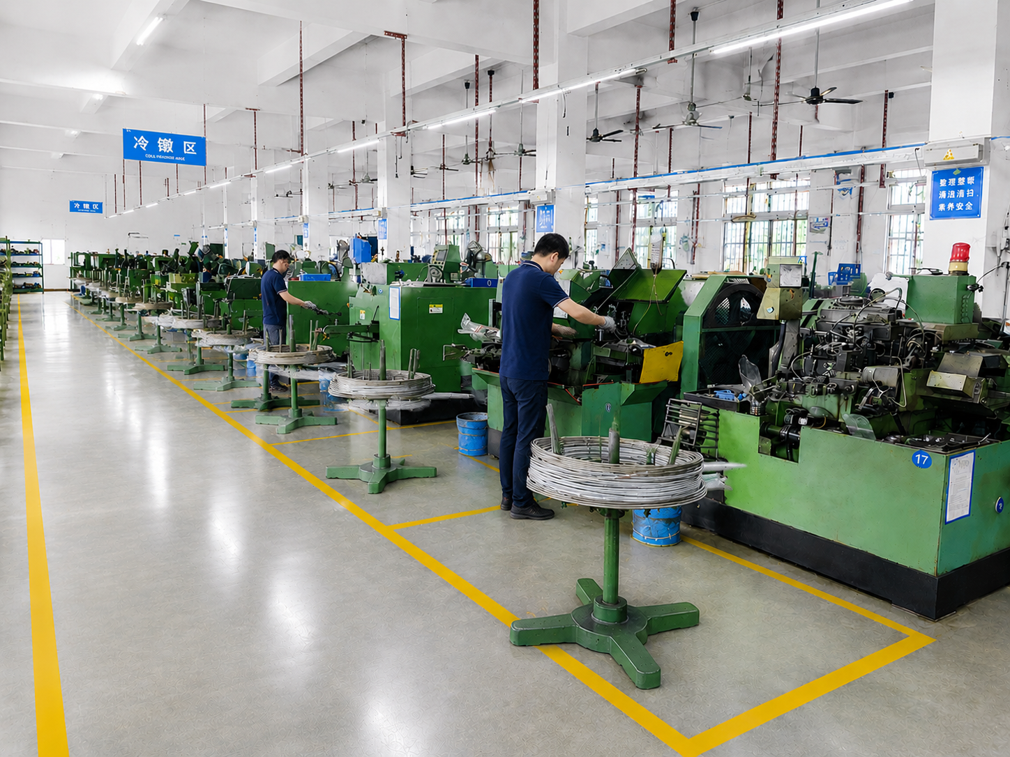 Cold heading area at Shi Shi Tong with forming machines and wire stands in production