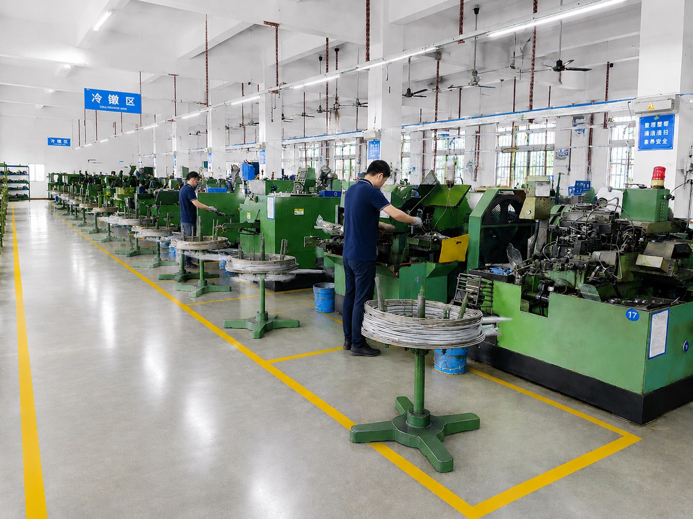 Multi-station forming machine running small headed parts at Shi Shi Tong