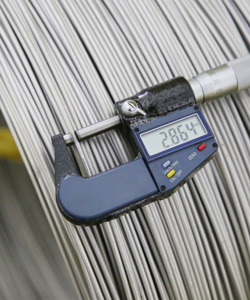 Incoming bar stock checked for diameter and grade at the Shi Shi Tong plant