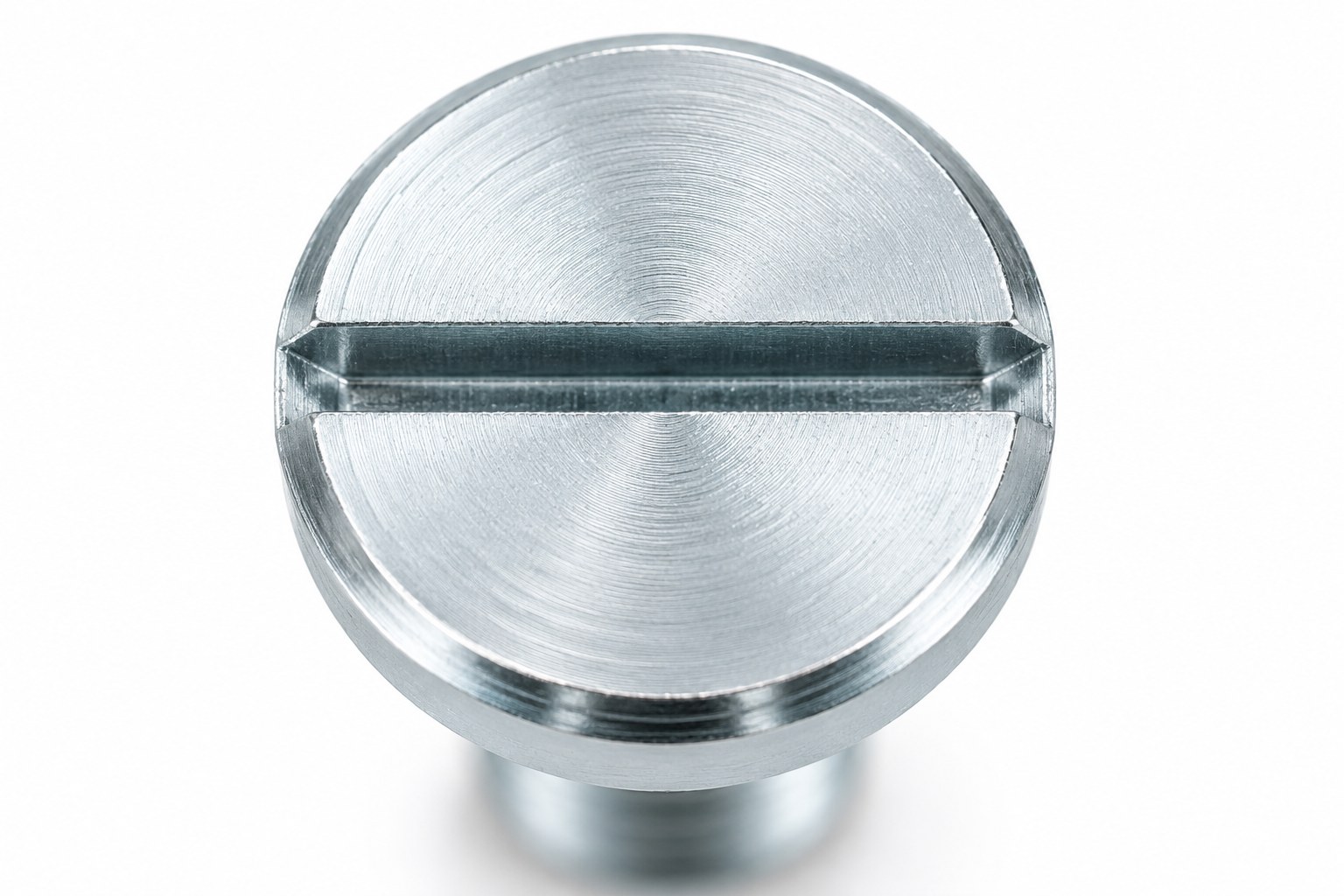 Top face of a white zinc plated low-profile slotted screw head, single slot cut across the full head diameter